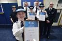 Cadet Halle Kennedy shows Attestation Certificate with (L-R) Head Cadet Leader, PC Francine Hunt, Assistant Chief Inspector Adrian Hall, Cadet Harry Hicks, Deputy LPA Commander Robert Murray, Cadet Lucy Lovell and LPA Commander Rory Freeman. Pic TVP.