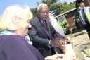 2002: Sir Trevor McDonald and Valerie Bell lay the foundation stone of Douglas House