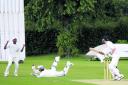 East Oxford wicket-keeper Bilal Chauhan just clings on to an edge from Shrivenham’s James Harris  Picture: Ric Mellis