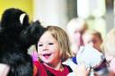 Four-year-old Olivia Neil enjoys an Orange Hat Summer Adventure event at The Theatre last month