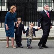Gordon Brown leaving Downing Street with his wife and young sons