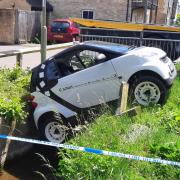 Police help smart car out of tricky spot