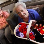 Launton Grange Care Home residents with their knitted soldiers and poppies