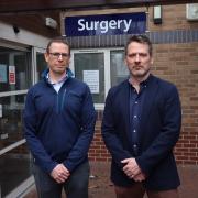 Dr Will O’Gorman (left) and Dr Toby Quartley (right), pictured outside the Victoria House Surgery of Alchester Medical Group. Photo credit: Chris A'Court