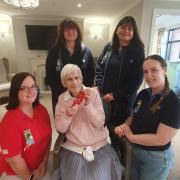Constance Gardner with the Brownies at Launton Grange care home, Bicester. Credit: Launton Grange care home