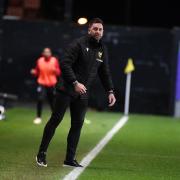 Oxford United head coach Des Buckingham on the touchline