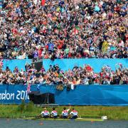 Oxford’s Andrew Triggs Hodge (left) and his men’s four colleagues salute the passionate home crowd after rowing to a gold medal at Eton Dorney