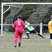 Ardley United's Billy Gillett scores a penalty against Clanfield in the Oxfordshire Senior Cup   Picture: Paul Gibbens