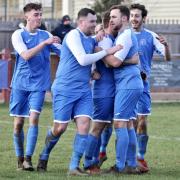 Clanfield striker Jozef Fullerton celebrates with his team mates after extending the lead against Easington Sports  Picture: Paul Gibbens