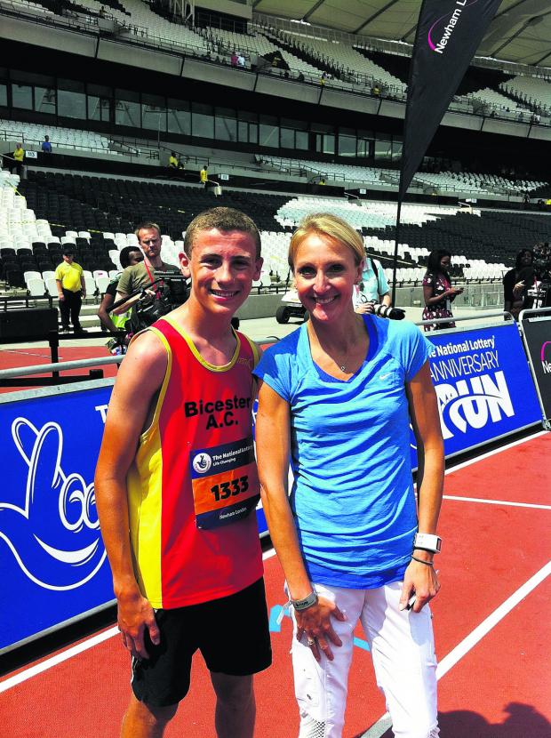 Bicester’s Tom Gould is congratulated by women’s marathon world record holder Paula Radcliffe after competing at the Olympic Stadium