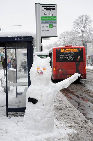 A snowman signals for a bus on Banbury Road. Pic: Dave Fleming