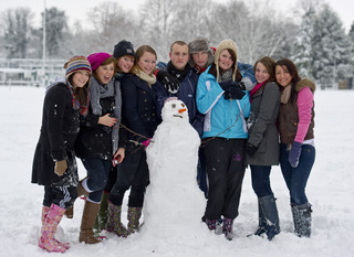 Group of Witney teenagers pose with their snowman
Pic: Mark Hemsworth 