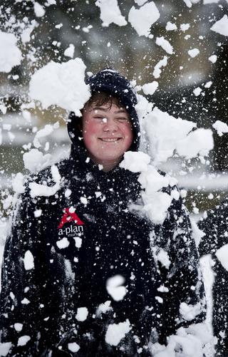 Will Quartly, 16, enjoying a snow ball fight in Witney on the Leys playing fields.
Pic: Mark Hemsworth