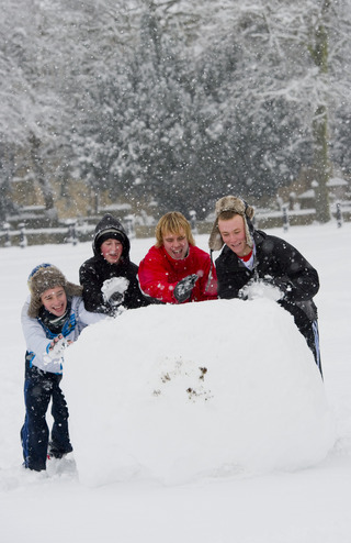 Group of lads roll a huge snow ball on the Leys playing field.
Pic: Mark Hemsworth