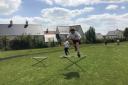 Year 6 pupils take part in the hurdle. Picture supplied by St Edburg's CE Primary School