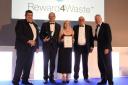Receiving the Excellence in Technology Award: L-R Neill Lawson-Smith CIS Ltd; Steve Clarke, CEO, Cryptocycle; Rachel Warren, marketing director, Cryptocycle; Tony McGurk, Chairman, Cryptocycle; Rory Bremner.