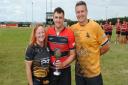 Brenda Cyster presents the Lauren Cyster Megabowl Trophy to Blackheath 2nd captain Lewis Hollidge, alongside Chinnor’s Jon Lavin, who organised the event Picture: Chinnor RFC Thame