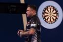 Gerwyn Price cruised into the second round at the World Grand Prix in Leicester