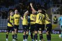 Oxford United’s players celebrate Cameron Brannagan’s goal. Picture: David Fleming