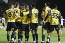 Oxford United players celebrate during the win against Charlton Athletic. Picture: David Fleming