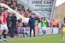 Liam Manning on the touchline at Morecambe