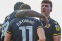 Oisin Smyth celebrates with goalscorer Marcus Browne