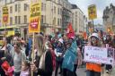 Hundreds of striking teachers marched through the streets of Oxford as their long-running dispute over pay continues