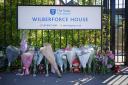 Flowers and toys placed outside the Study Preparatory School in Wimbledon, south-west London, after a Land Rover crashed into the girls’ prep school building on the last day of term, killing two girls. Picture date: Friday July 7, 2023.