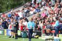 Oxford United boss Liam Manning on the touchline at Fleetwood Town