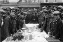 Soldiers at a welcome home celebration tea in the Market Place, Wantage, in 1914