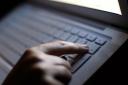 MPs have warned of the threat posed by online fraud (Dominic Lipinski/PA)
