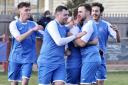 Clanfield striker Jozef Fullerton celebrates with his team mates after extending the lead against Easington Sports  Picture: Paul Gibbens