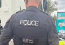 A police officer in the crackdown.