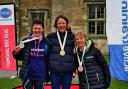 Bicester Tri’s Jo Gundle stands on the top step of the podium at the Ashridge Duathlon