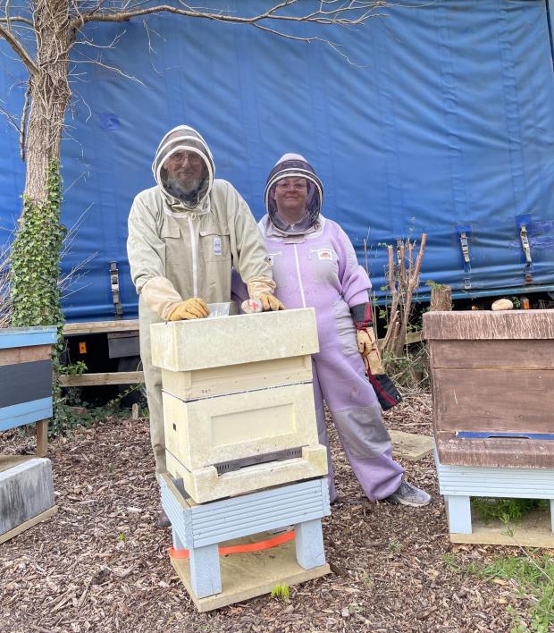 Bicester Advertiser: Beekeepers Kate Newman and her Dad who run B.K Apiary together.
