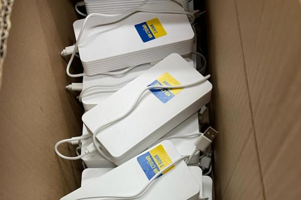 White powerbanks ready to be sent to Ukraine