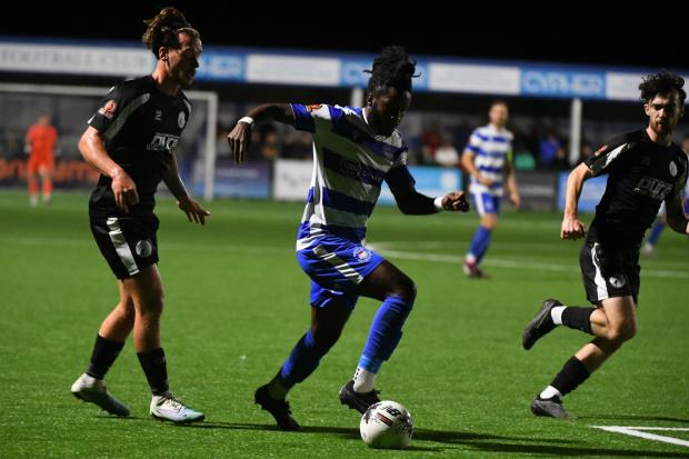 Tafari Moore looks to get forward for Oxford City