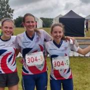 Fiona Bunn (right) with victorious Great Britain teammates Megan Keith (left) and Grace Molloy