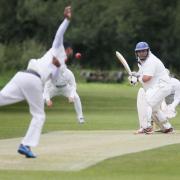 Sandford St Martin’s Jim Howe prepares to fend off this delivery from Oxford & Bletchingdon Nondescripts opening bowler Arfan Ahmed Picture: Ed Nix