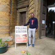 Dr okeke stood outside the polling station