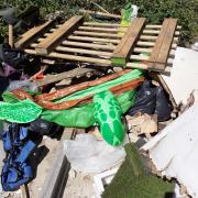 Inflatable turtle paddling pool and other fly-tipped waste