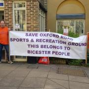 Callum Vinall (far left) with Roger Wise (far right) and two members of the 'Save Oxford Road Sports Ground' campaign