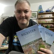 Bicester historian Matthew Hathaway with his newly published book, Bicester: A Potted History
