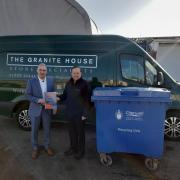 Tim Rotherham, The Granite House owner (left hand side) and Dewain Clarke, Business Waste Officer at Cherwell District Council (right hand side). Credit: Cherwell District Council
