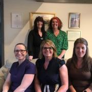 Back row: (L-R) Founder Mechelle Harris and head of Children’s Team, Kelly Squires. Front row: (L-R) Sian Harvey, counselling coordinator, Zoe Draper, manager and head of the Lymphedema Clinic, and Kirsty Anders, head of Complementary Therapy Team