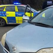 Police officers with the car.