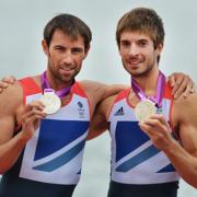 Mark Hunter (left) and Zac Purchase with their silver on the podium