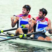 Zac Purchase (left) and Mark Hunter show off their silver medals after their brave display in the lightweight men’s double sculls
