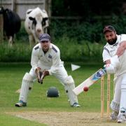 Oxford & Bletchingdon Nondescripts’ batsman Wasim Mohammed hits out – with some interested onlookers paying close attention – during his side’s 70-run defeat at the hands of Sandford St Martin in Division 3 of the Cherwell