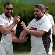A delighted Majid Khan celebrates one of his four wickets as Garsington & Cowley beat Marsh Gibbon Picture: Ric Mellis